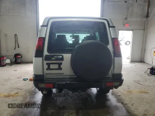 2004 Land Rover Discovery SE z VIN SALTW19404A850159, wystawiony jako Copart lot #51779445 z przebiegiem 166 321 mil mil oraz Szkoda całkowita • Salvage title. Historia ofert i sprzedaży dostępna na DreamBid. Obrazek 6.