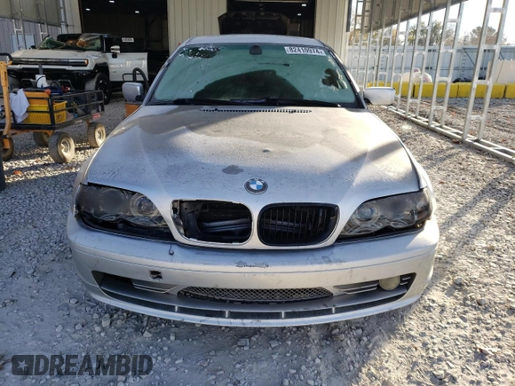2003 BMW 3 Series 330i with VIN WBAEV534X3KM05095, listed as a Copart auction lot 82410974 with 220,644 mi miles and Salvage Title. Bid and sale history available at carsss.com. Image 5.
