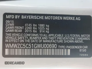 2016 MINI Countryman S with VIN WMWZC5C51GWU00690, listed as a Copart auction lot 55077095 with 104,176 mi miles and Salvage title. Bid and sale history available at DreamBid. Image 12.
