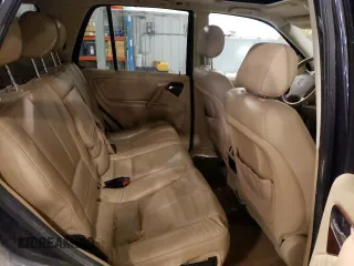 2002 Mercedes-Benz M 320/430/500 с VIN 4JGAB54E52A319680, выставлен на аукционе Copart как лот 55136505 с пробегом 192 023 миль миль и На запчасти • Non repairable. История ставок и продаж доступна на DreamBid. Изображение 11.