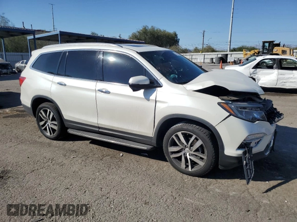 2017 Honda Pilot Touring with VIN 5FNYF6H92HB092491, listed as a Copart auction lot 76141434 with 56,002 mi miles and Salvage Title. Bid and sale history available at carsss.com. Image 4.