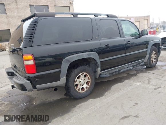 2002 Chevrolet Suburban Z71 with VIN 3GNFK16T12G354322, listed as a IAAI auction lot 41646865 with 229,700 mi miles. Bid and sale history available at carsss.com. Image 4.