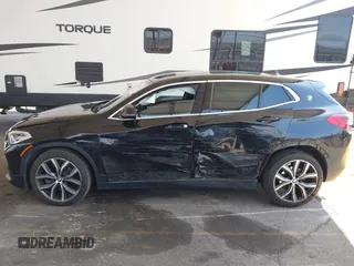 2018 BMW X2 sDrive28i with VIN WBXYJ3C32JEJ84291, listed as a IAAI auction lot 42575234 with 65,081 mi miles and . Bid and sale history available at DreamBid. Image 6.