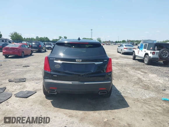 2018 Cadillac XT5 Luxury AWD z VIN 1GYKNDRS0JZ139185, wystawiony jako IAAI lot #42551426 z przebiegiem 109 699 mil mil oraz . Historia ofert i sprzedaży dostępna na DreamBid. Obrazek 16.