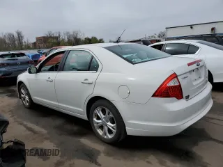 2012 Ford Fusion SE with VIN 3FAHP0HA0CR101030, listed as a Copart auction lot 54010405 with 98,263 mi miles and Salvage title. Bid and sale history available at DreamBid. Image 2.