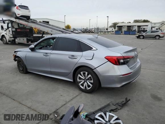 2022 Honda Civic Sedan LX with VIN 2HGFE2F23NH512677, listed as a Copart auction lot 80998734 with 50,996 mi miles and Salvage Title. Bid and sale history available at carsss.com. Image 2.