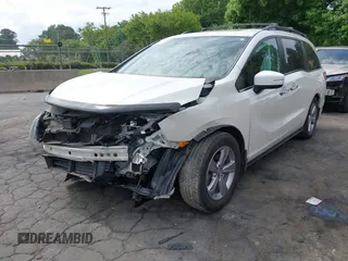 2018 Honda Odyssey EX-L with VIN 5FNRL6H77JB047919, listed as a IAAI auction lot 42112505 with 108,706 mi miles and . Bid and sale history available at DreamBid. Image 17.