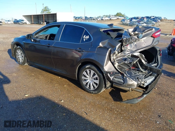 2019 Toyota Camry Hybrid LE z VIN 4T1B31HK4KU516123, wystawiony jako IAAI lot #41733410 z przebiegiem 98 273 mil mil oraz . Historia ofert i sprzedaży dostępna na DreamBid. Obrazek 3.