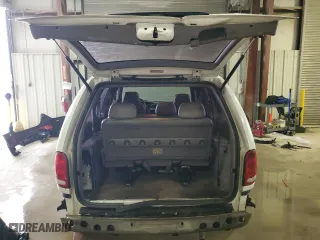2000 Dodge Caravan with VIN 2B4GP25G4YR791420, listed as a Copart auction lot 83426754 with 141,635 mi miles and Salvage Title. Bid and sale history available at carsss.com. Image 6.