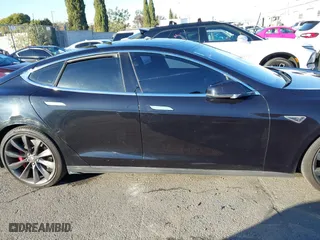 2015 Tesla Model S 85D with VIN 5YJSA1H46FF096603, listed as a IAAI auction lot 41084296 with 114,466 mi miles. Bid and sale history available at carsss.com. Image 13.