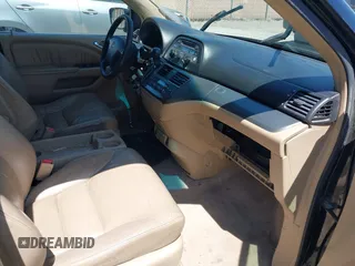 2005 Honda Odyssey EX-L z VIN 5FNRL38645B096460, wystawiony jako IAAI lot #42347856 z przebiegiem 230 329 mil mil oraz . Historia ofert i sprzedaży dostępna na DreamBid. Obrazek 5.