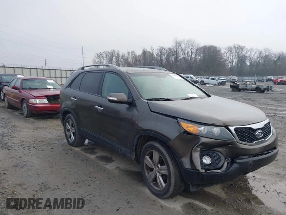 2012 Kia Sorento EX z VIN 5XYKU4A23CG302594, wystawiony jako IAAI lot #41644499 z przebiegiem 173 355 mil mil oraz . Historia ofert i sprzedaży dostępna na DreamBid. Obrazek 6.