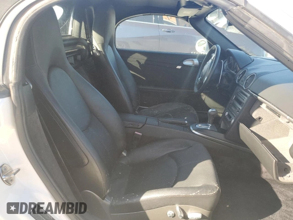 2007 Porsche Boxster S z VIN WP0CB29837U730970, wystawiony jako Copart lot #77829184 z przebiegiem Nie podano mil oraz Szkoda całkowita • Salvage title. Historia ofert i sprzedaży dostępna na DreamBid. Obrazek 10.