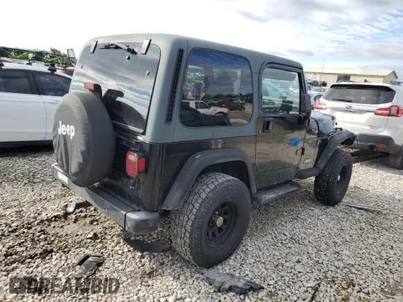 2002 Jeep Wrangler X with VIN 1J4FA39S42P736991, listed as a Copart auction lot 86180034 with 170,510 mi miles and Clean Title. Bid and sale history available at carsss.com. Image 3.