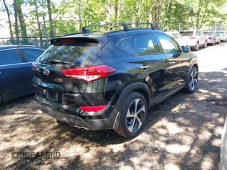 2016 Hyundai Tucson Limited with VIN KM8J33A28GU259038, listed as a IAAI auction lot 42200578 with 109,109 mi miles. Bid and sale history available at carsss.com. Image 4.