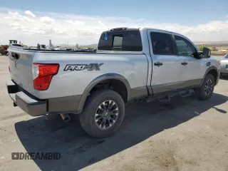 2017 Nissan Titan XD PRO-4X with VIN 1N6BA1F45HN525928, listed as a Copart auction lot 55773415 with 100,295 mi miles and Clean Title. Bid and sale history available at carsss.com. Image 3.