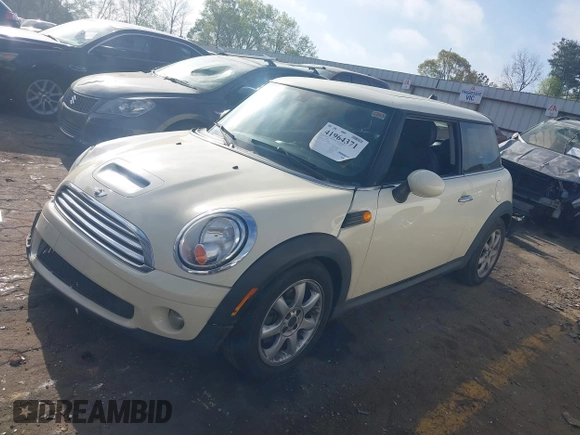 2007 MINI Hardtop with VIN WMWMF33587TT52466, listed as a IAAI auction lot 41964371 with 129,842 mi miles and . Bid and sale history available at DreamBid. Image 2.