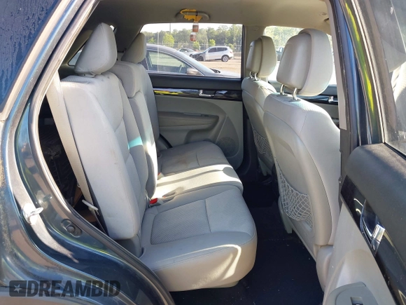 2011 Kia Sorento LX with VIN 5XYKT3A1XBG011576, listed as a IAAI auction lot 42062990 with 227,954 mi miles. Bid and sale history available at carsss.com. Image 8.