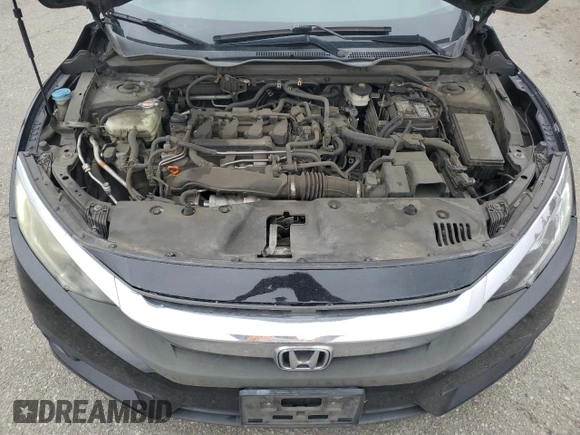2016 Honda Civic EX-T z VIN 2HGFC1F33GH634029, wystawiony jako Copart lot #56026045 z przebiegiem 168 676 mil mil oraz Szkoda całkowita • Salvage title. Historia ofert i sprzedaży dostępna na DreamBid. Obrazek 11.