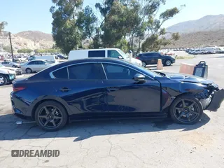 2021 Mazda 3 S with VIN JM1BPAALXM1326956, listed as a IAAI auction lot 42304248 with 55,104 mi miles and . Bid and sale history available at DreamBid. Image 14.