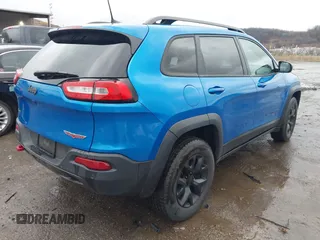 2018 Jeep Cherokee Trailhawk with VIN 1C4PJMBX3JD512813, listed as a IAAI auction lot 41457312 with 125,644 mi miles. Bid and sale history available at carsss.com. Image 4.