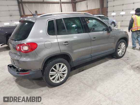 2011 Volkswagen Tiguan SE with VIN WVGBV7AX9BW524807, listed as a IAAI auction lot 41921439 with 204,813 mi miles and . Bid and sale history available at DreamBid. Image 4.