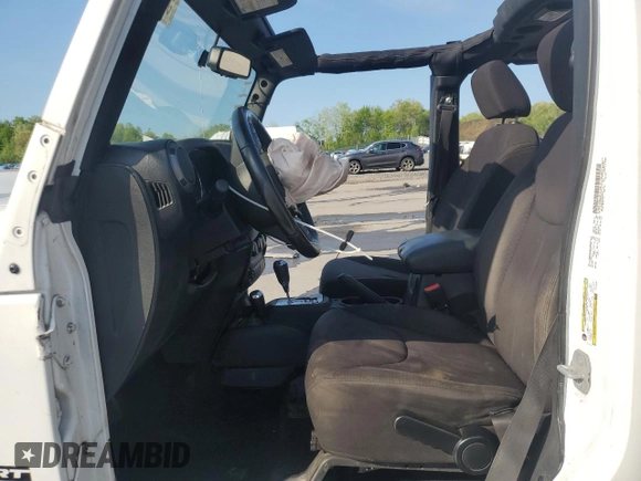 2013 Jeep Wrangler Unlimited Sport z VIN 1C4BJWDG3DL701619, wystawiony jako Copart lot #55880055 z przebiegiem Nie podano mil oraz Szkoda całkowita • Salvage title. Historia ofert i sprzedaży dostępna na DreamBid. Obrazek 7.