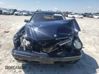 2001 Mercedes-Benz E-Class AWD with VIN WDBJH82J91X057063, listed as a Copart auction lot 70235274 with 174,846 mi miles and Salvage Title. Bid and sale history available at carsss.com. Image 5.