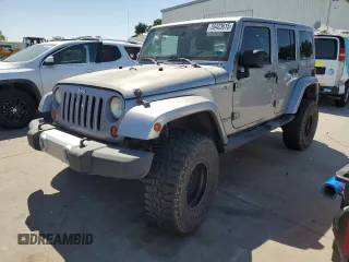 2013 Jeep Wrangler Unlimited Sahara with VIN 1C4BJWEG5DL662756, listed as a Copart auction lot 56423615 with 189,355 mi miles and Salvage title. Bid and sale history available at DreamBid. Image 1.