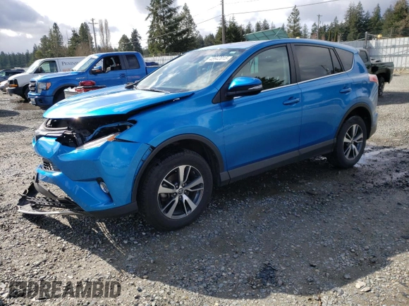 2018 Toyota RAV4 XLE with VIN 2T3RFREV3JW752934, listed as a Copart auction lot 48942015 with 74,182 mi miles and Salvage Title. Bid and sale history available at DreamBid. Image 1.