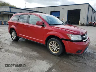 2015 Dodge Journey SXT with VIN 3C4PDDBG3FT749519, listed as a Copart auction lot 55326965 with 228,210 mi miles and Salvage Title. Bid and sale history available at DreamBid. Image 4.