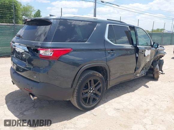 2018 Chevrolet Traverse LT Cloth z VIN 1GNERGKW0JJ242781, wystawiony jako IAAI lot #42458318 z przebiegiem 16 177 mil mil oraz . Historia ofert i sprzedaży dostępna na DreamBid. Obrazek 4.