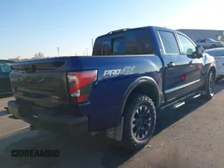 2021 Nissan Titan Pro-4X z VIN 1N6AA1ED1MN517476, wystawiony jako IAAI lot #41422217 z przebiegiem 62 650 mil mil oraz . Historia ofert i sprzedaży dostępna na DreamBid. Obrazek 4.