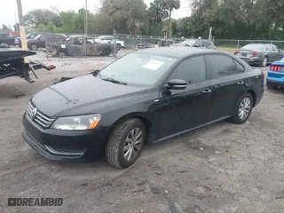 2015 Volkswagen Passat 1.8T S with VIN 1VWAT7A31FC019965, listed as a IAAI auction lot 41620572 with 145,141 mi miles. Bid and sale history available at carsss.com. Image 2.