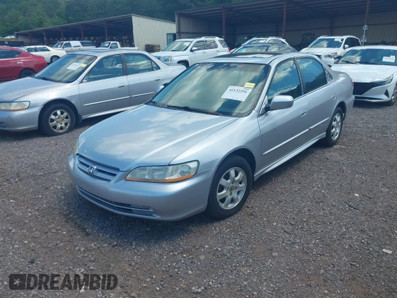 2002 Honda Accord EX z VIN 1HGCG56622A013090, wystawiony jako IAAI lot #42132291 z przebiegiem 152 567 mil mil oraz . Historia ofert i sprzedaży dostępna na DreamBid. Obrazek 2.