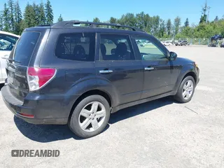2009 Subaru Forester X with VIN JF2SH636X9G793415, listed as a IAAI auction lot 42614382 with 116,965 mi miles and . Bid and sale history available at DreamBid. Image 4.