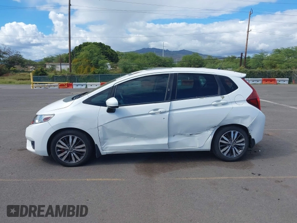 2015 Honda Fit EX-L with VIN 3HGGK5H8XFM753011, listed as a IAAI auction lot 41878734 with 121,514 mi miles and . Bid and sale history available at DreamBid. Image 14.