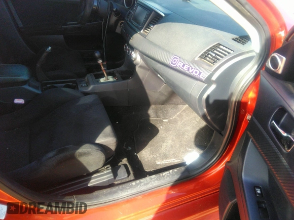 2010 Mitsubishi Lancer Evolution GSR with VIN JA32W8FV7AU003558, listed as a IAAI auction lot 40856259 with 123,639 mi miles and . Bid and sale history available at DreamBid. Image 5.