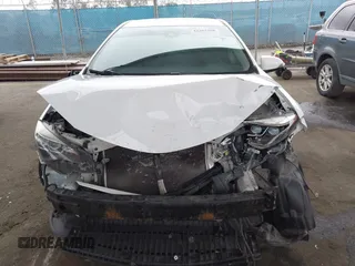 2019 Toyota Corolla L with VIN 5YFBURHE7KP862111, listed as a IAAI auction lot 42205368 with 96,823 mi miles and . Bid and sale history available at DreamBid. Image 13.