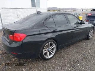 2013 BMW 3 Series 328i with VIN WBA3A5C56DF453232, listed as a IAAI auction lot 41794450 with 152,304 mi miles. Bid and sale history available at carsss.com. Image 4.