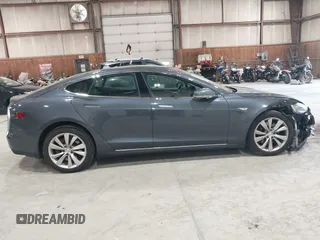 2016 Tesla Model S 90D with VIN 5YJSA1E22GF124109, listed as a IAAI auction lot 42487466 with 83,593 mi miles and . Bid and sale history available at DreamBid. Image 13.