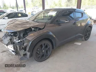 2021 Toyota C-HR LE with VIN JTNKHMBX5M1129253, listed as a IAAI auction lot 42169707 with 54,312 mi miles and . Bid and sale history available at DreamBid. Image 2.