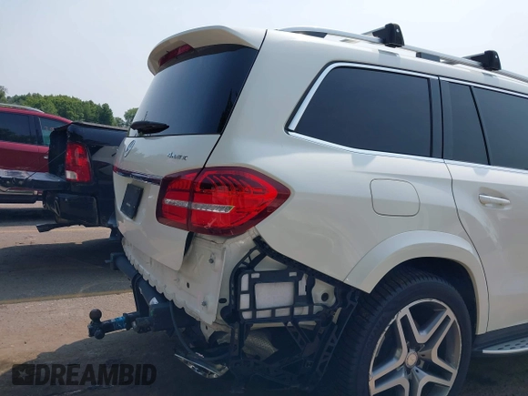 2017 Mercedes-Benz GLS 550 z VIN 4JGDF7DE4HA879647, wystawiony jako IAAI lot #39999023 z przebiegiem 97 372 mil mil oraz . Historia ofert i sprzedaży dostępna na DreamBid. Obrazek 19.