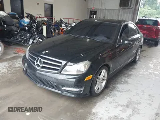 2014 Mercedes-Benz C 250 Sport with VIN WDDGF4HB4ER309280, listed as a IAAI auction lot 42351858 with 95,417 mi miles and . Bid and sale history available at DreamBid. Image 2.
