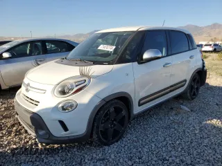 2014 FIAT 500L Trekking with VIN ZFBCFADH6EZ011642, listed as a Copart auction lot 71474774 with 104,327 mi miles and Salvage Title. Bid and sale history available at carsss.com. Image 1.