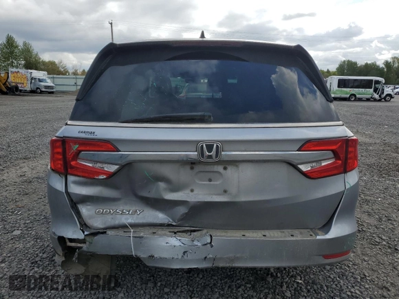 2018 Honda Odyssey EX-L z VIN 5FNRL6H72JB099281, wystawiony jako Copart lot #53515425 z przebiegiem 137 493 mil mil oraz Szkoda całkowita • Salvage title. Historia ofert i sprzedaży dostępna na DreamBid. Obrazek 6.