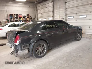 2015 Chrysler 300 with VIN 2C3CCAGG9FH864678, listed as a IAAI auction lot 41812118 with 107,873 mi miles. Bid and sale history available at carsss.com. Image 4.