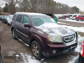 2011 Honda Pilot EX-L with VIN 5FNYF4H56BB024171, listed as a IAAI auction lot 41442621 with 105,104 mi miles. Bid and sale history available at carsss.com. Image 13.