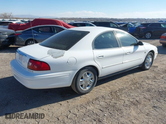 2003 Mercury Sable LS Premium with VIN 1MEHM55S73G630347, listed as a IAAI auction lot 41427588 with 125,285 mi miles. Bid and sale history available at carsss.com. Image 4.