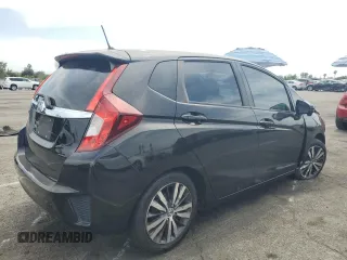 2015 Honda Fit EX-L z VIN 3HGGK5H81FM765225, wystawiony jako Copart lot #56765815 z przebiegiem 126 730 mil mil oraz Szkoda całkowita • Salvage title. Historia ofert i sprzedaży dostępna na DreamBid. Obrazek 3.